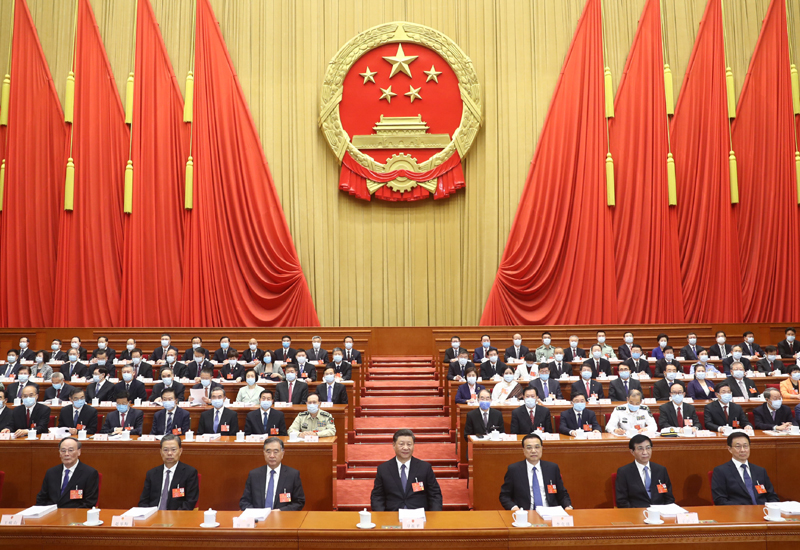 5月21日，中国人民政治协商会议第十三届全国委员会第三次会议在北京人民大会堂开幕。这是习近平、李克强、栗战书、王沪宁、赵乐际、韩正、王岐山在主席台就座。新华社记者 李学仁 摄